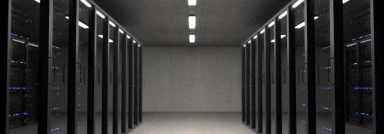 Server racks in data center representing electronic equipment