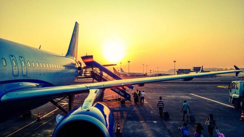 Aircraft taking off at dusk representing air freight options from Dubai